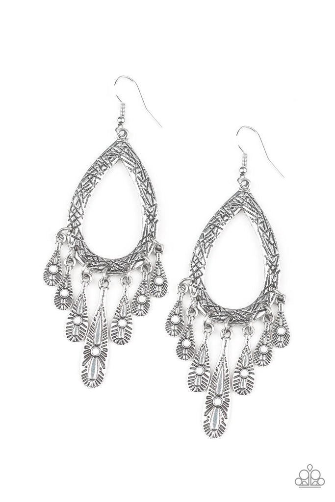 Dotted with dainty white beads, flared ornate silver beads swing from the bottom of a textured silver teardrop frame for a seasonal flair. Earring attaches to a standard fishhook fitting.  Sold as one pair of earrings.