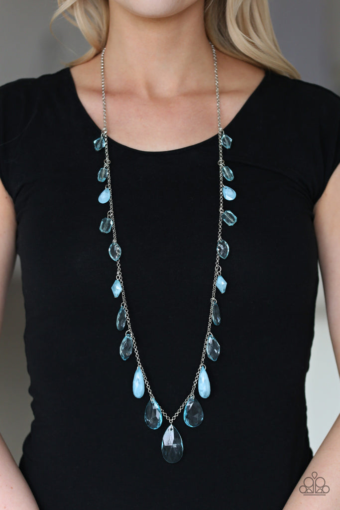 A gorgeous collection of glassy and cloudy blue crystal-like beads trickle along a shimmery silver chain down the chest in a whimsical fashion. Features an adjustable clasp closure.  Sold as one individual necklace. Includes one pair of matching earrings.