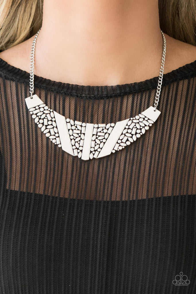 Varying in shape, a collection of dainty silver frames coalesce into a striking crescent pendant below the collar for a statement making look. Features an adjustable clasp closure.  Sold as one individual necklace. Includes one pair of matching earrings.