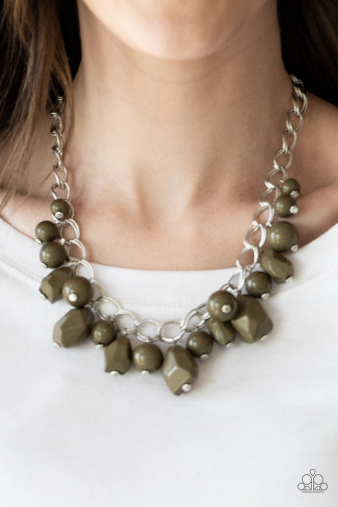 Varying in shape and shimmer, smooth and faceted Olive Green beads trickle from doubled silver chain links, creating a glamorous fringe below the collar. Features an adjustable clasp closure.   Sold as one individual necklace. Includes one pair of matching earrings.