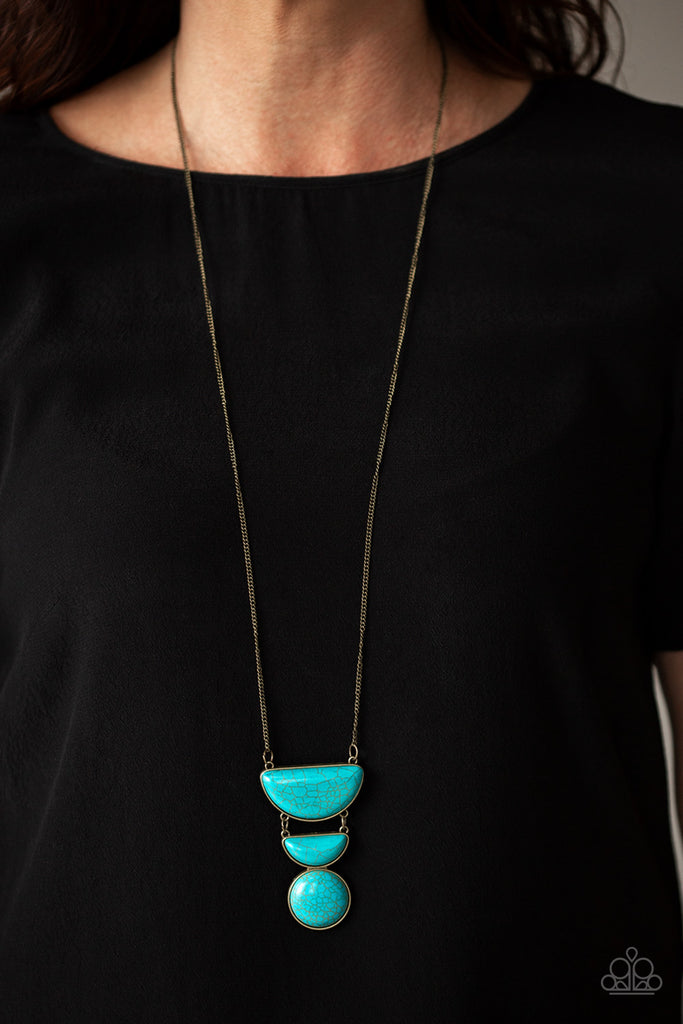 Chiseled into tranquil half-moon and round shapes, refreshing turquoise stone pendants connect down the chest for a seasonal look. Features an adjustable clasp closure.  Sold as one individual necklace. Includes one pair of matching earrings.
