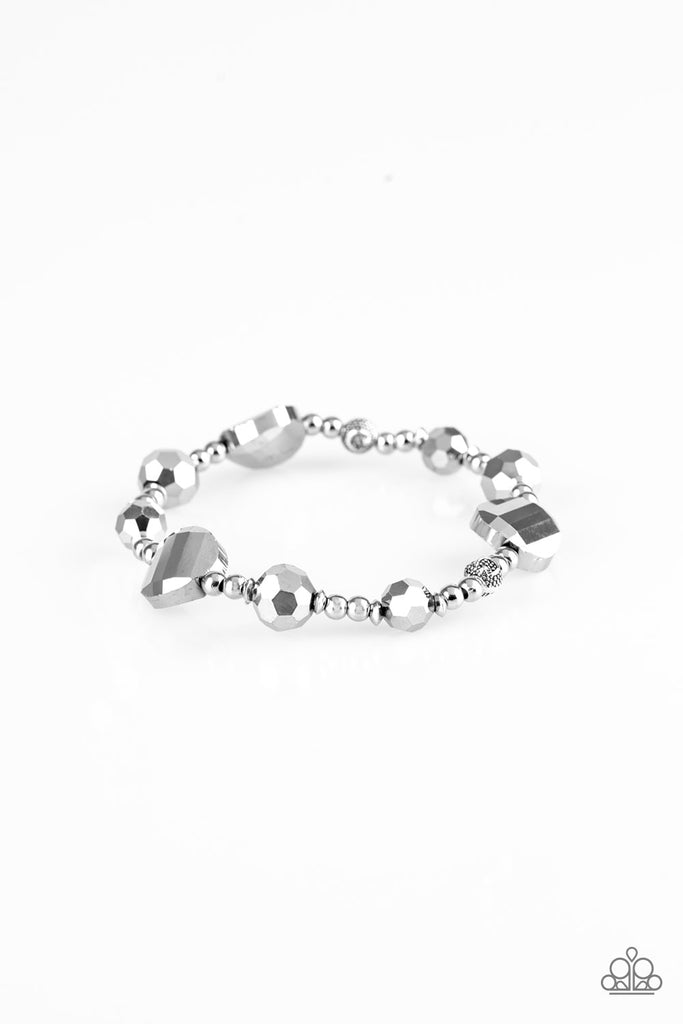 A collection of glittery hematite beads and shiny silver beads are threaded along a stretchy band around the wrist for a refined look.  Sold as one individual bracelet.