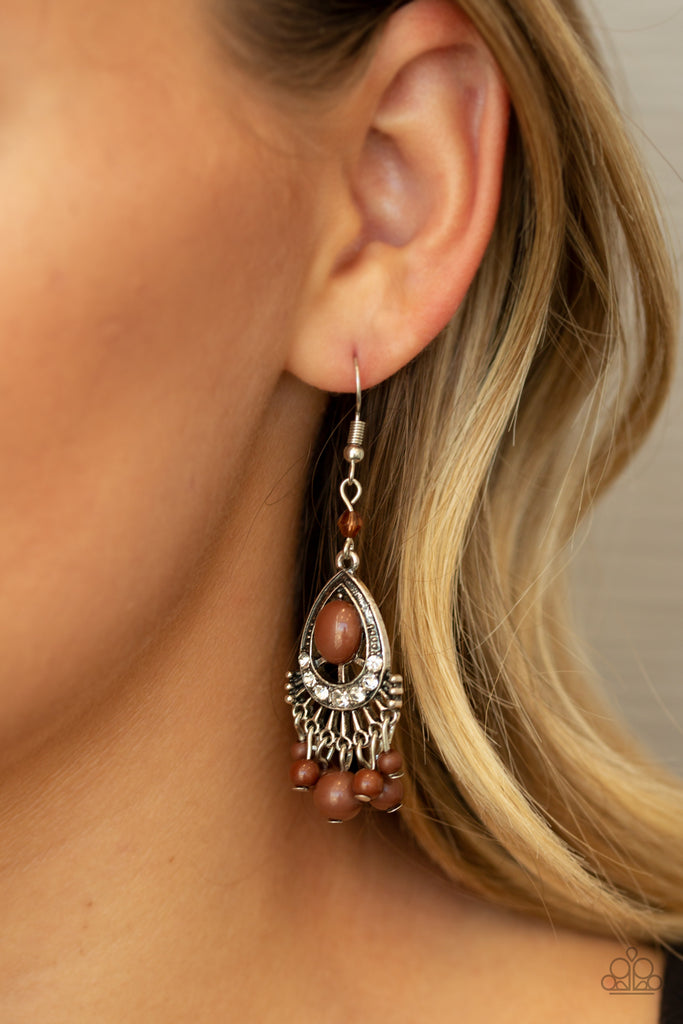 A collection of bubbly brown beads swing from the bottom of a brown beaded and white rhinestone encrusted teardrop frame, creating a flirtatious fringe. Earring attaches to a standard fishhook fitting.  Sold as one pair of earrings.