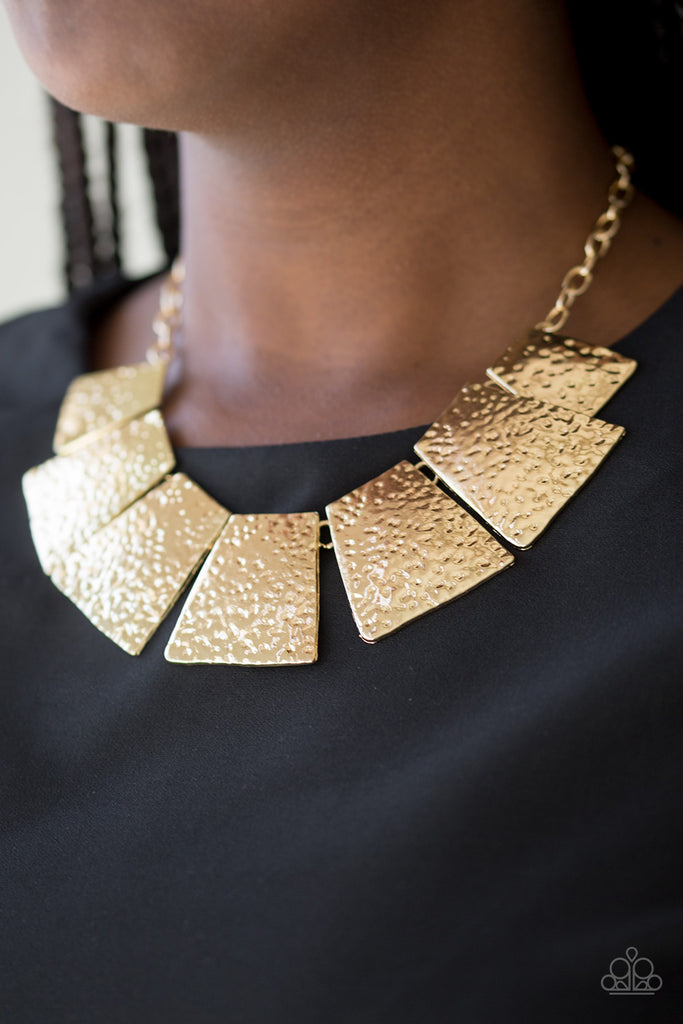 Here Comes The Huntress-Gold $5 Paparazzi Necklace - The Sassy Sparkle