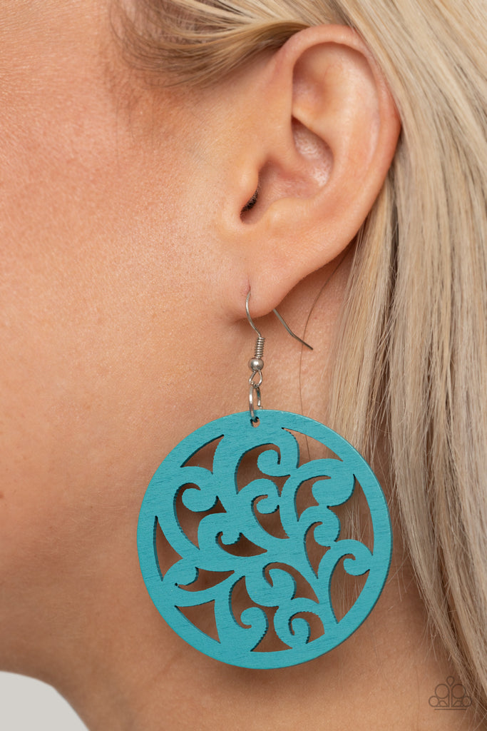 Stenciled in vine-like filigree, a wooden frame swings from the ear for a refreshing look. Earring attaches to a standard fishhook fitting.  Sold as one pair of earrings.