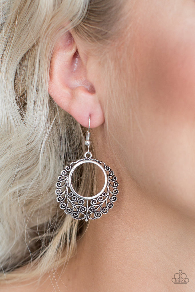 Brushed in an antiqued shimmer, vine-like filigree climbs a silver hoop for a seasonal look.  Earring attaches to a standard fishhook fitting.