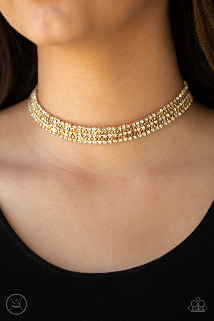 Featuring sleek square fittings, strands of glittery white rhinestones connect with rows of gold box chains around the neck for a glittery twist. Features an adjustable clasp closure.  Sold as one individual choker necklace. Includes one pair of matching earrings.