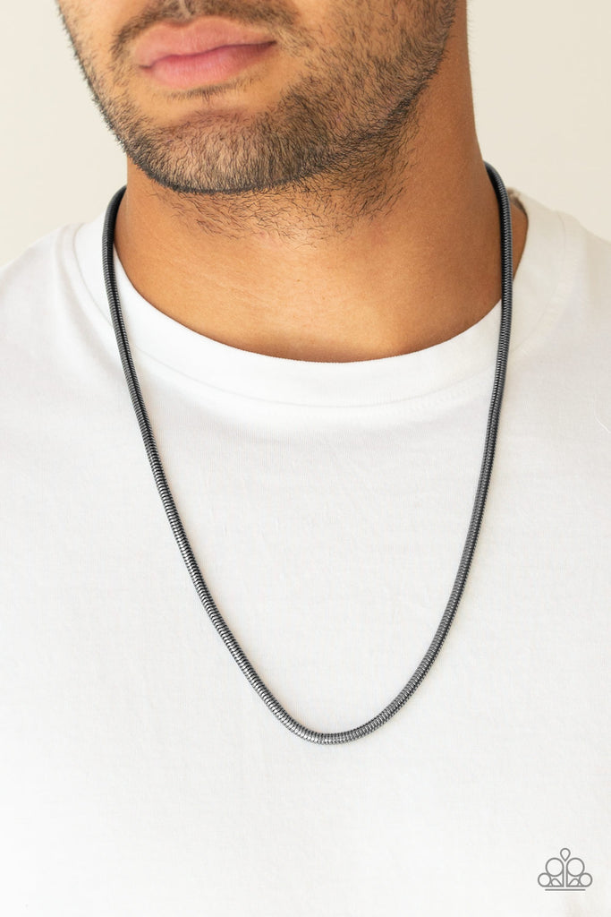 Brushed in a high-sheen shimmer, a rounded gunmetal snake chain drapes across the chest for a sleek look. Features an adjustable clasp closure.  Sold as one individual necklace.   Get The Complete Look! Bracelet: "Winning - Black" (Sold Separately)