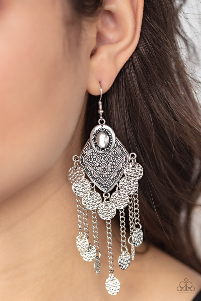 Embossed in pebble-like textures, dainty silver discs swing from the bottom of a floral embossed frame and the ends of antiqued silver chains, creating a double fringe. Earring attaches to a standard fishhook fitting.  Sold as one pair of earrings.