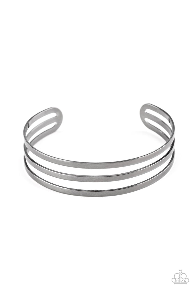Flat gunmetal bars race across the wrist, coalescing into a sleek cuff for a casual look.  Sold as one individual bracelet.