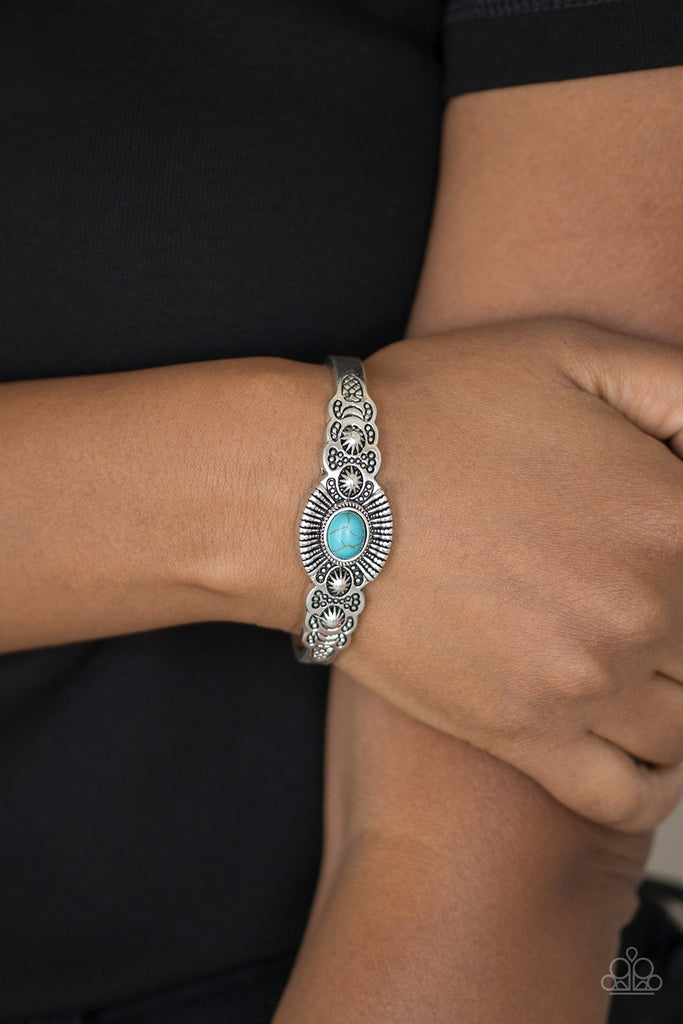 Dotted with a refreshing turquoise stone center, a dainty silver cuff radiating with shimmery southwestern inspired detail curls around the wrist for a seasonal look.  Sold as one individual bracelet.  New Kit