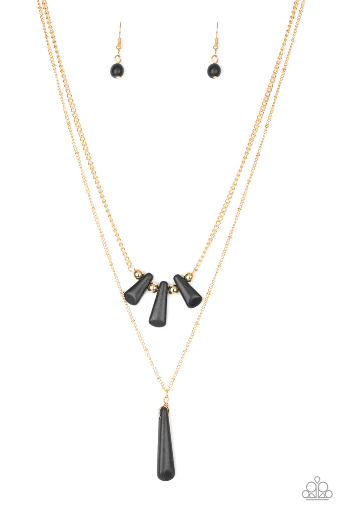 Chiseled into flared teardrop shapes, a dainty fringe of black stones and golden beads gives way to a large stone pendant, creating earthy layers down the chest. Features an adjustable clasp closure.  Sold as one individual necklace. Includes one pair of matching earrings.