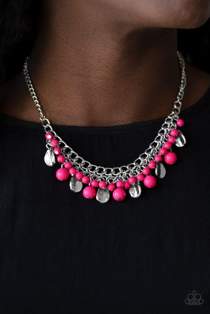 Flirty pink beads and curved silver teardrops swing from the bottom of interlocking silver chains, creating a flirtatious fringe below the collar. Features an adjustable clasp closure.  Sold as one individual necklace. Includes one pair of matching earrings.