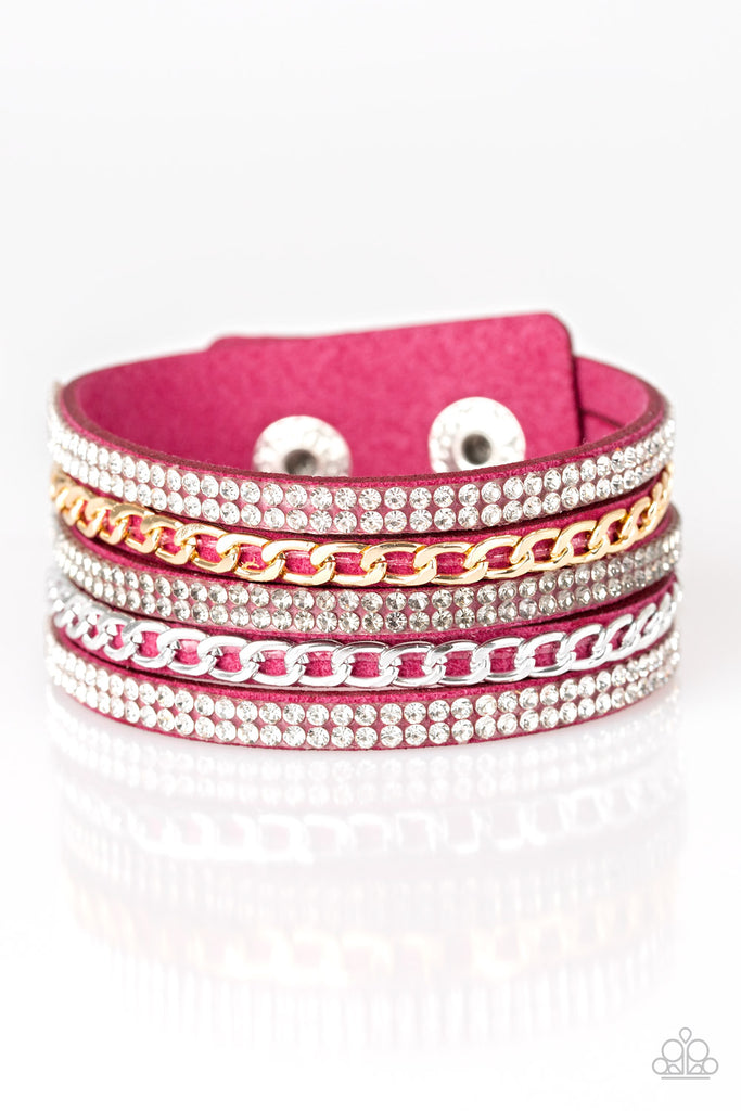 Glassy white and smoky rhinestones are encrusted along strands of pink suede. Glistening silver and gold chains are added to the bands, adding edgy industrial shimmer to the sassy palette. Features an adjustable snap closure.  Sold as one individual bracelet.