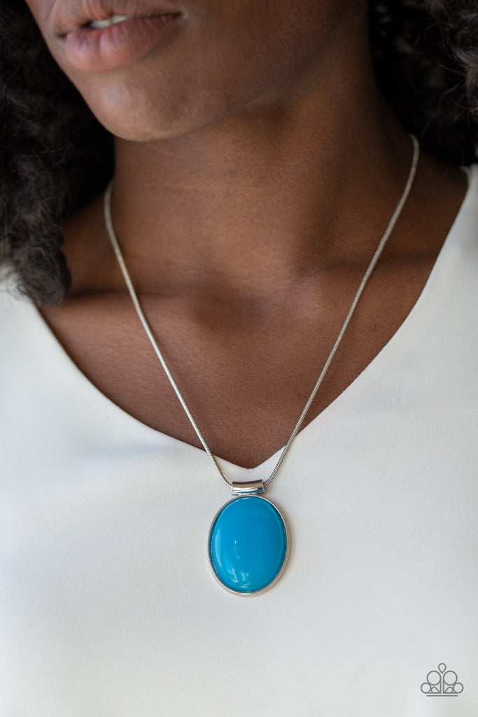 Featuring sleek silver fittings, a tranquil blue bead slides along a rounded snake chain below the collar for a dramatic pop of color. Features an adjustable clasp closure.  Sold as one individual necklace. Includes one pair of matching earrings.