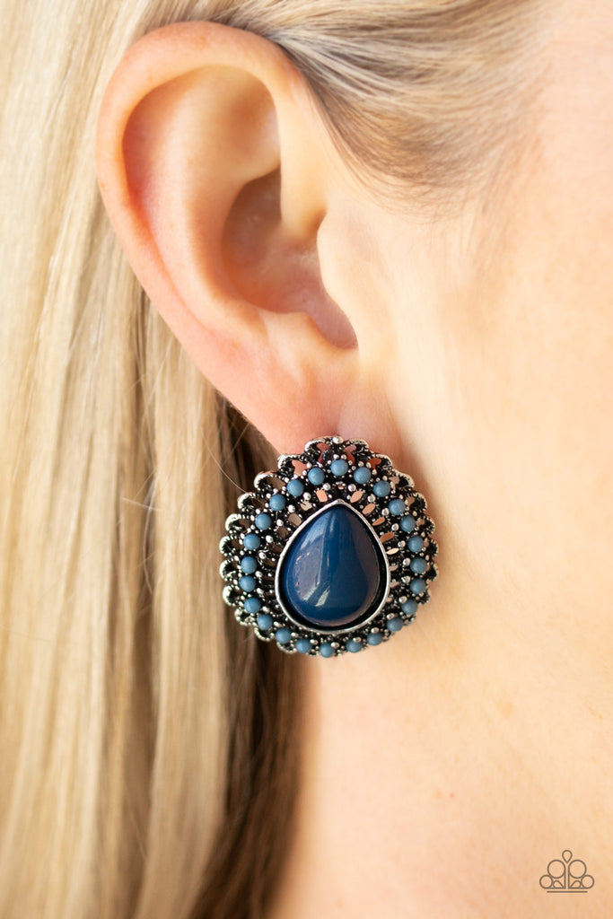 Dainty light blue beads spin around an oversized dark blue teardrop bead, creating a colorful frame. Earring attaches to a standard post fitting.  Sold as one pair of post earrings.