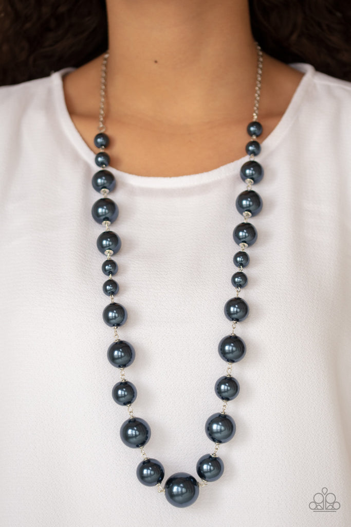 Infused with dainty blue pearls, a bubbly collection of oversized pearls link across the chest for a timeless finish. Features an adjustable clasp closure.  Sold as one individual necklace. Includes one pair of matching earrings.
