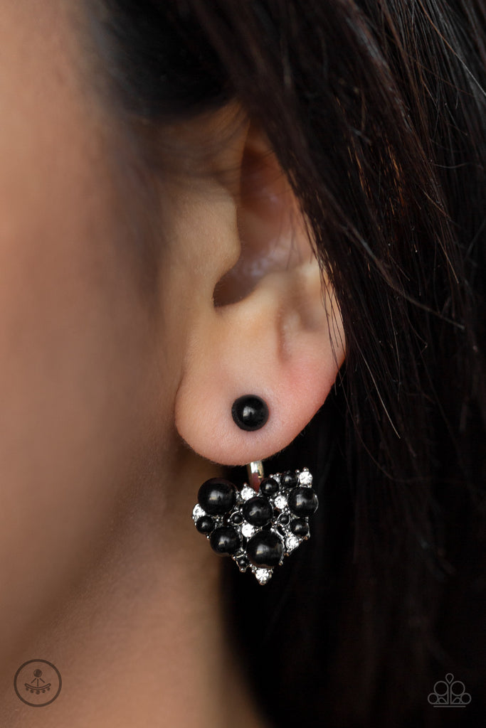 A solitaire black bead attaches to a double-sided post, designed to fasten behind the ear. Radiating with dainty white rhinestones and matching black beads, the heart-shaped double sided-post peeks out beneath the ear for a refined look. Earring attaches to a standard post fitting.  Sold as one pair of double-sided post earrings.