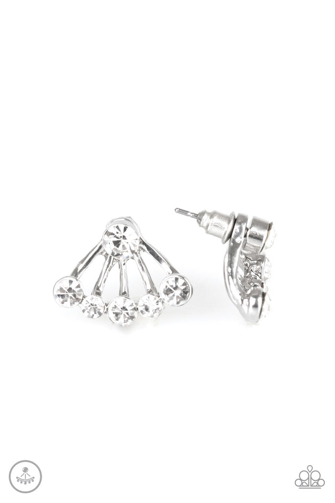 A solitaire white rhinestone attaches to a double-sided post, designed to fasten behind the ear. Radiating with a flared row of glassy white rhinestones, the double sided-post peeks out beneath the ear for an edgy look. Earring attaches to a standard post fitting.  Sold as one pair of double-sided post earrings.