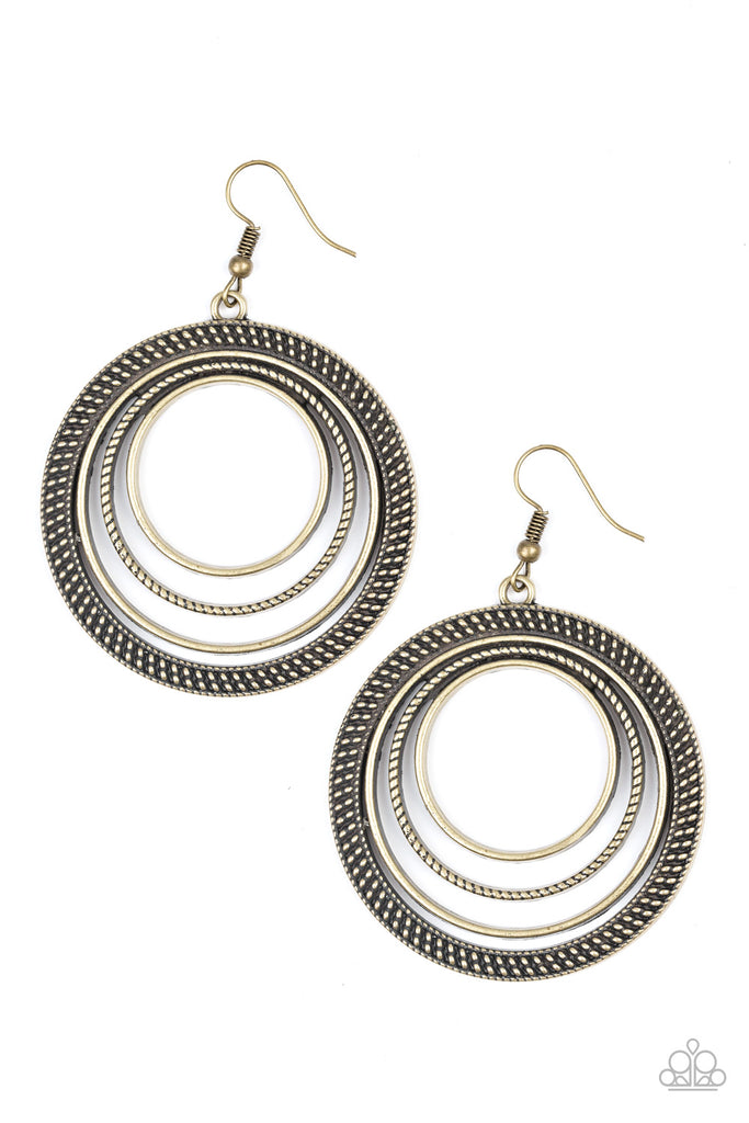 totally-textured-brass  Radiating with smooth, studded, and rope-like textures, mismatched brass hoops join into a rippling frame for a tribal inspired look. Earring attaches to a standard fishhook fitting.  Sold as one pair of earrings.
