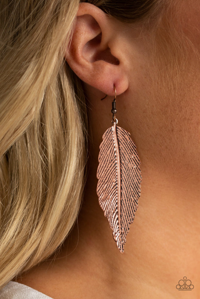 Etched and embossed in lifelike textures, a glistening copper feather swings from the ear for a seasonal look. Earring attaches to a standard fishhook fitting.  Sold as one pair of earrings.