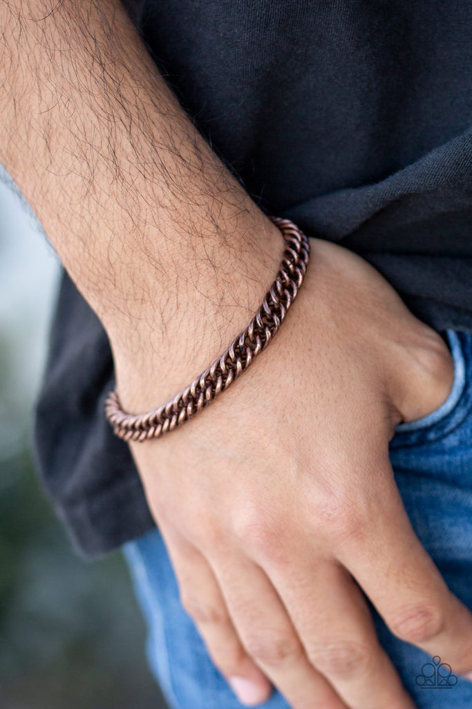 Brushed in an antiqued finish, a faceted copper chain links around the wrist for a rustic look. Features an adjustable clasp closure  Sold as one individual bracelet.  