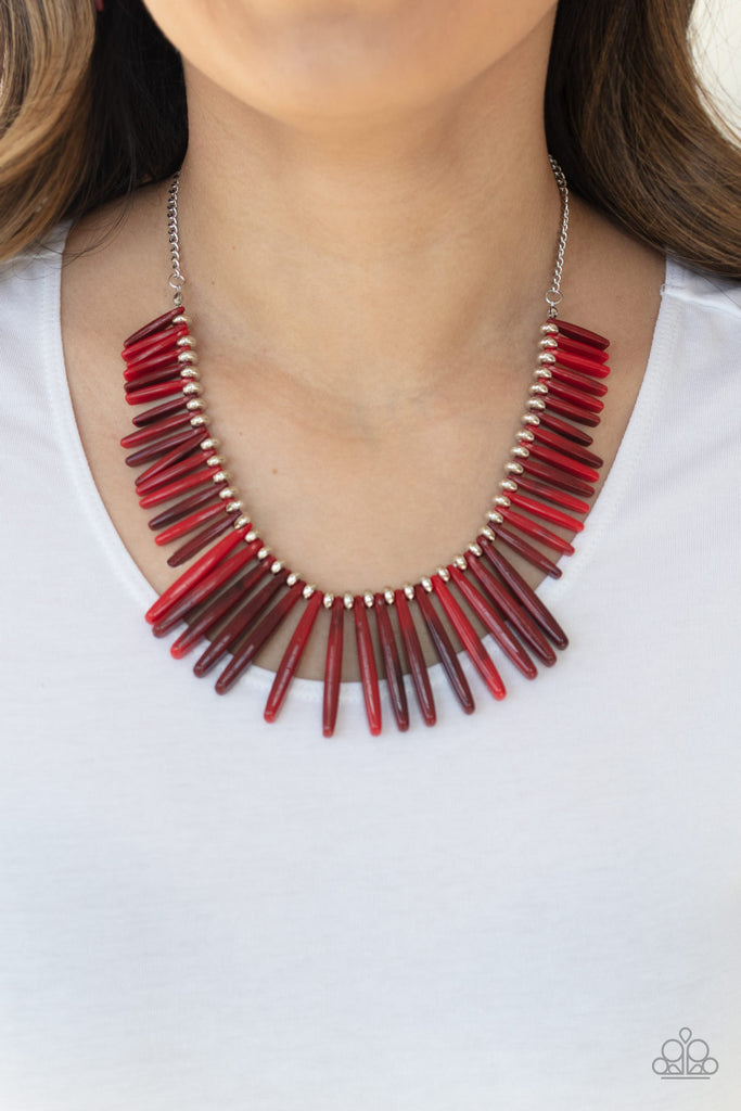 Flanked by dainty silver beads, smoky red rod-like acrylic frames are threaded along an invisible wire, creating a colorful fringe below the collar. Features an adjustable clasp closure.  Sold as one individual necklace. Includes one pair of matching earrings.  