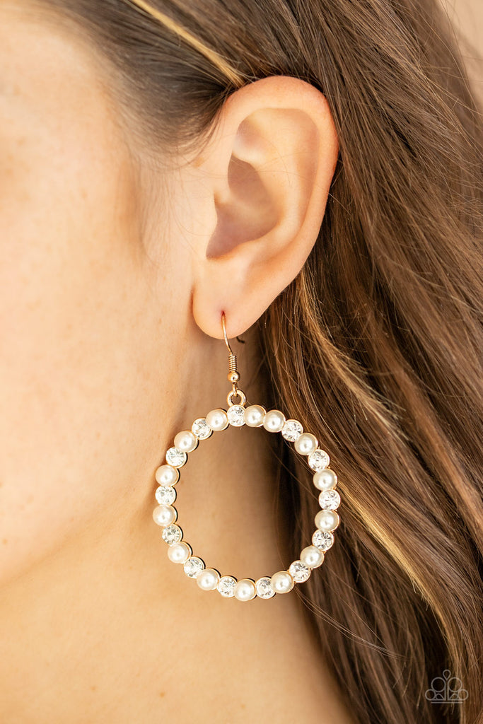 Pearl Palace-Gold Earring-Pearl-Rhinestone-PaparazziBubbly white pearls and glassy white rhinestones alternate along the front of a shimmery gold hoop for a timeless look. Earring attaches to a standard fishhook fitting.  Sold as one pair of earrings.