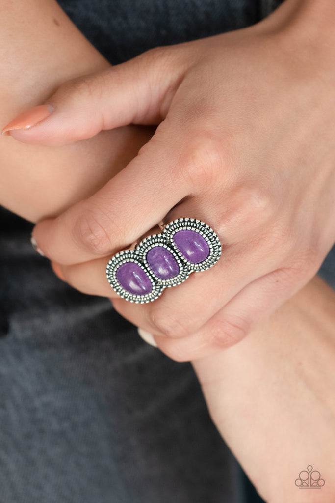 Featuring studded silver frames, a trio of imperfect purple stones stack across the finger for an ethereal look. Features a stretchy band for a flexible fit.  Sold as one individual ring.  New Kit