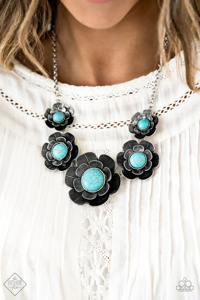 .Layers of lifelike silver petals bloom from refreshing turquoise centers as they link below the collar for a seasonal statement-making look. The floral frames gradually increase in size as they inch towards the center, resulting in a dramatic statement piece. Features an adjustable clasp closure./p>  Sold as one individual necklace. Includes one pair of matching earrings.