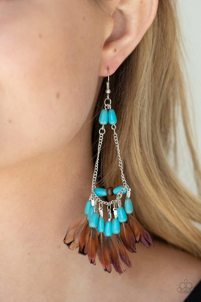 Infused with a wooden accent, an earthy assortment of teardrop turquoise stone beads and dainty brown feathers create a free-spirited fringe at the bottom of a shimmery silver chain teardrop for a wildly wonderful finish. Earring attaches to a standard fishhook fitting.  Sold as one pair of earrings.