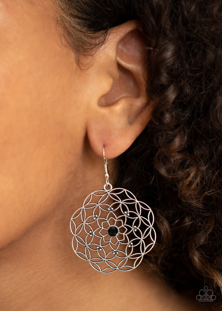 Dotted with a glittery black rhinestone center, studded silver filigree blooms into an enchanting floral frame. Earring attaches to a standard fishhook fitting.  Sold as one pair of earrings.