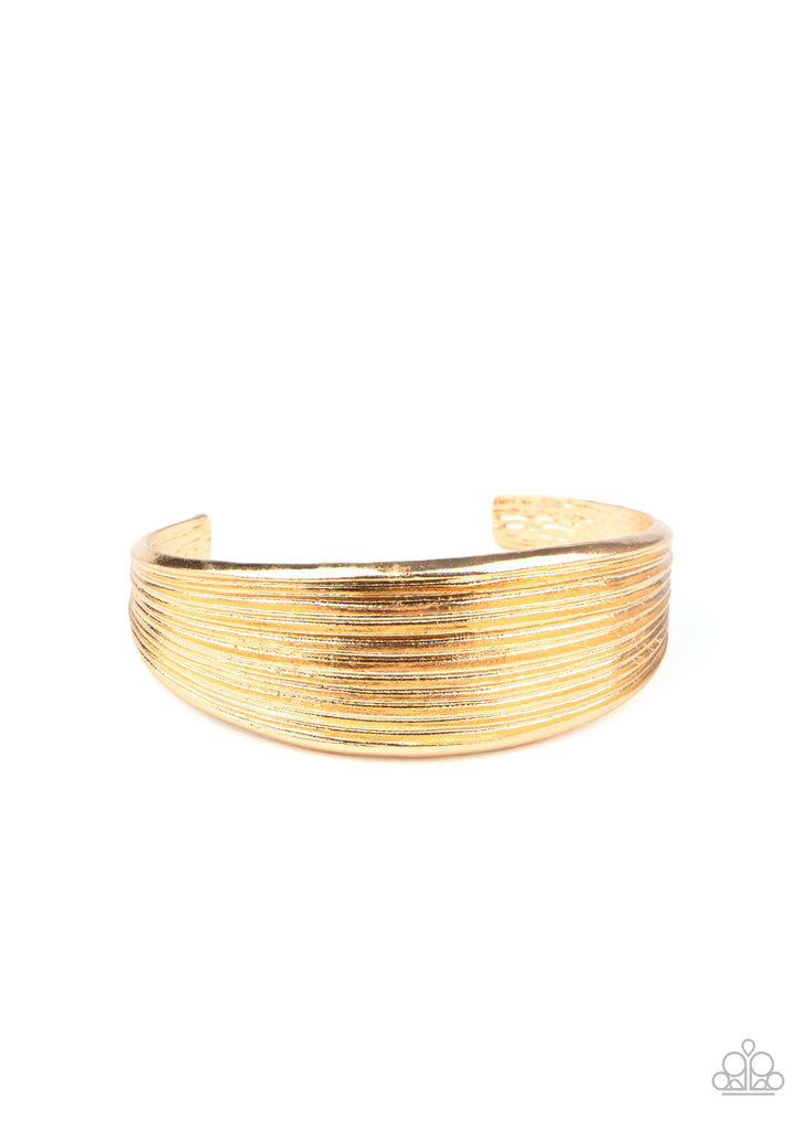 Featuring beveled linear texture, a sleek gold cuff delicately curls around the wrist for a dash of casual refinement.  Sold as one individual bracelet.  🟢 runs a little small.  May fit best on wrists with circumference of about 6.5 inches or less.