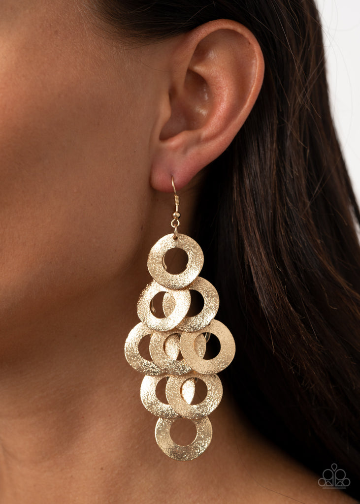 Delicately hammered in light-catching shimmer, rows of curved gold hoops delicately overlap into a noise-making lure. Earring attaches to a standard fishhook fitting.  Sold as one pair of earrings.