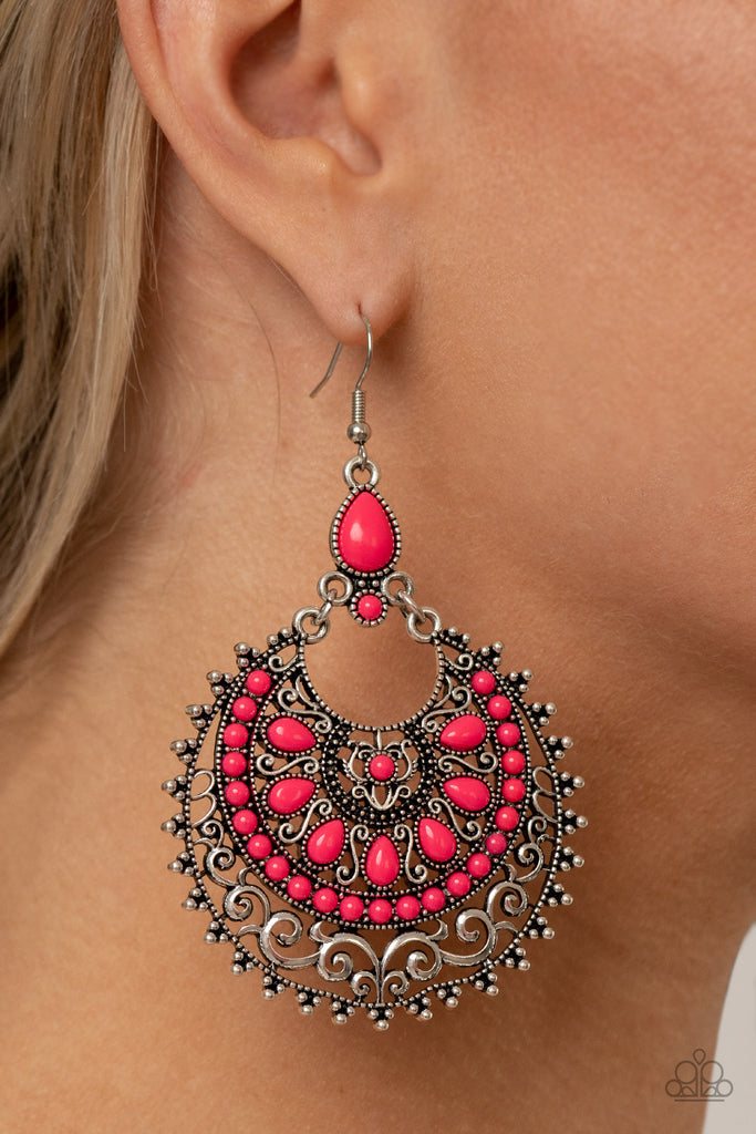 Featuring the flamboyant shade of Pink Peacock, a dainty collection of round and teardrop pink beads embellish the front of a decoratively studded and filigree filled silver frame for a whimsical splash of color. Earring attaches to a standard fishhook fitting.  Sold as one pair of earrings.