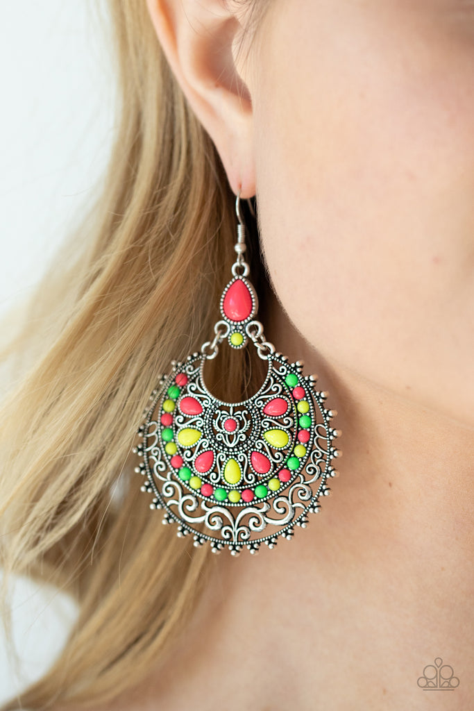 A dainty collection of round and teardrop neon pink, neon green, and Green Sheen beads embellish the front of a decoratively studded and filigree filled silver frame for a flamboyant splash of color. Earring attaches to a standard fishhook fitting.  Sold as one pair of earrings.