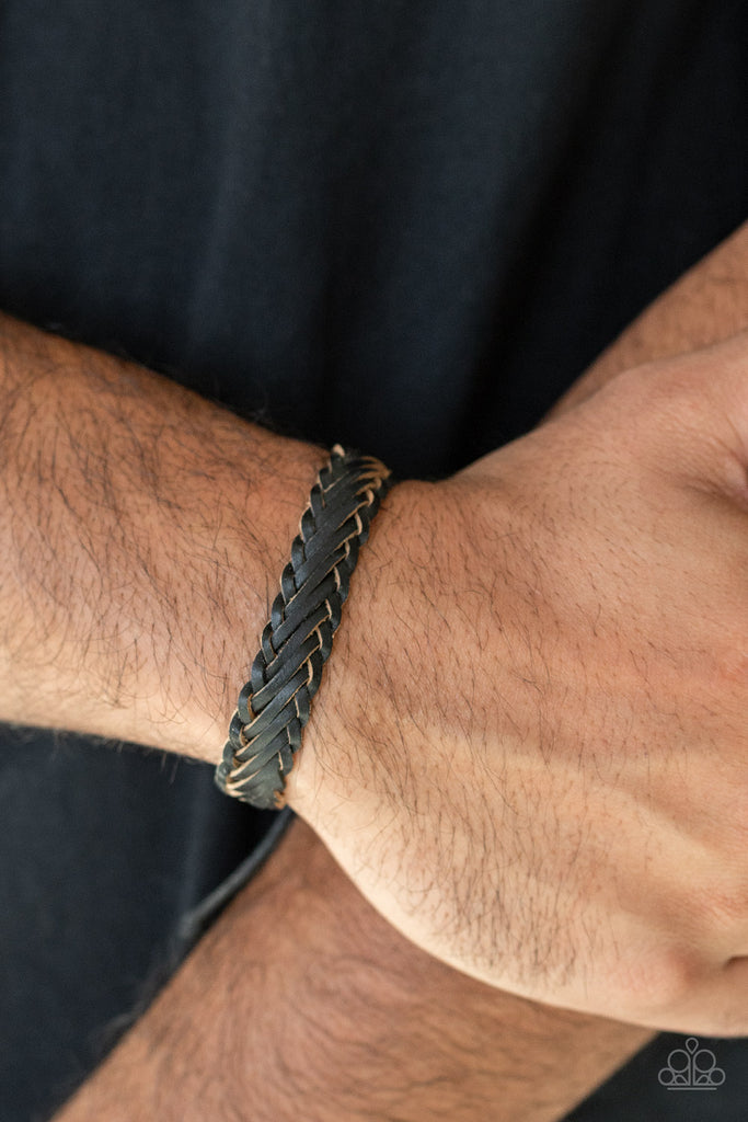 Rustic leather laces decoratively weave around the wrist, creating a rugged centerpiece. Features an adjustable sliding knot closure.  Sold as one individual bracelet.  