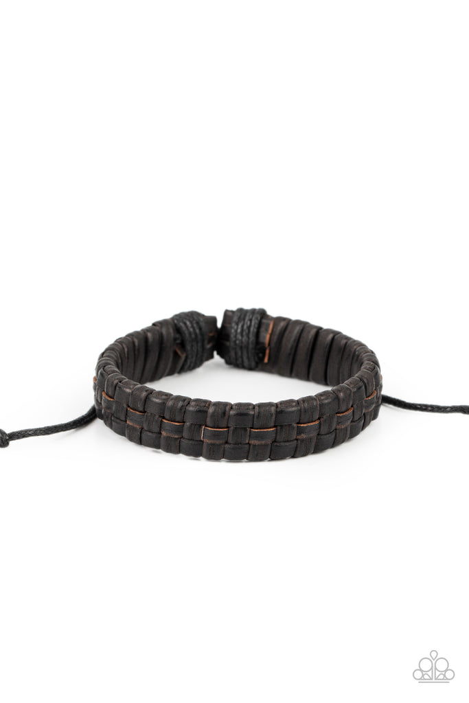 Leather laces weave around a leather band around the wrist, creating a rustic display. Features an adjustable sliding knot closure.  Sold as one individual bracelet.
