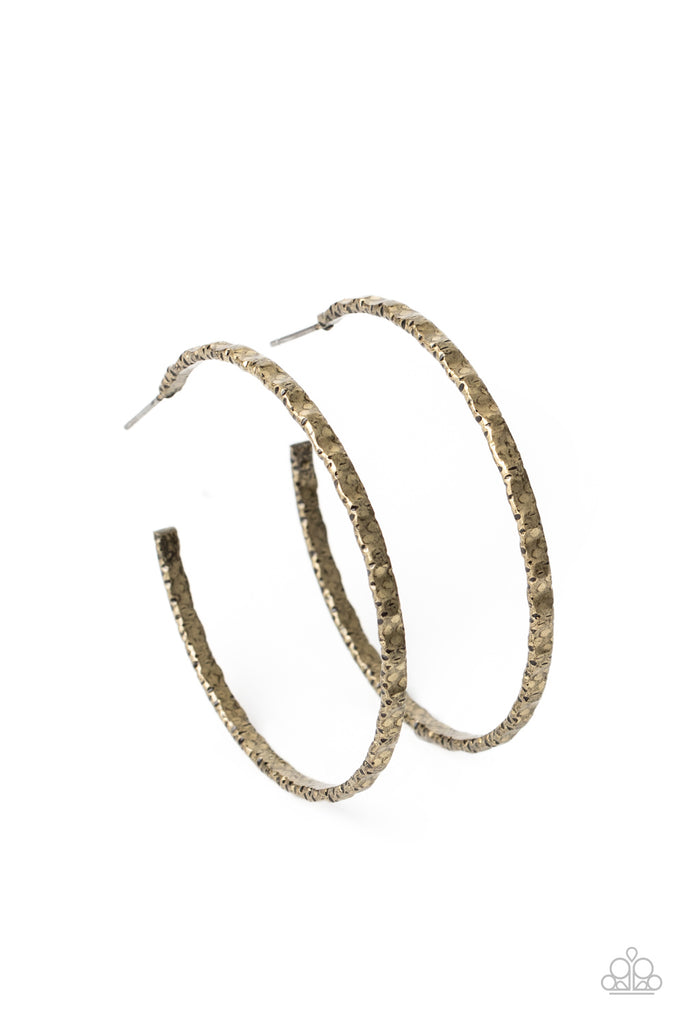Brushed in an antiqued finish, a gritty brass hoop is hammered in grungy details for an edgy industrial flair. Earring attaches to a standard post fitting. Hoop measures approximately 2" in diameter.  Sold as one pair of hoop earrings.