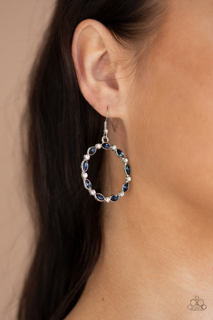 Encased in sleek silver frames, dainty white rhinestones and blue marquise gems delicately connect into a glittery hoop for a glamorous finish. Earring attaches to a standard fishhook fitting.  Sold as one pair of earrings.