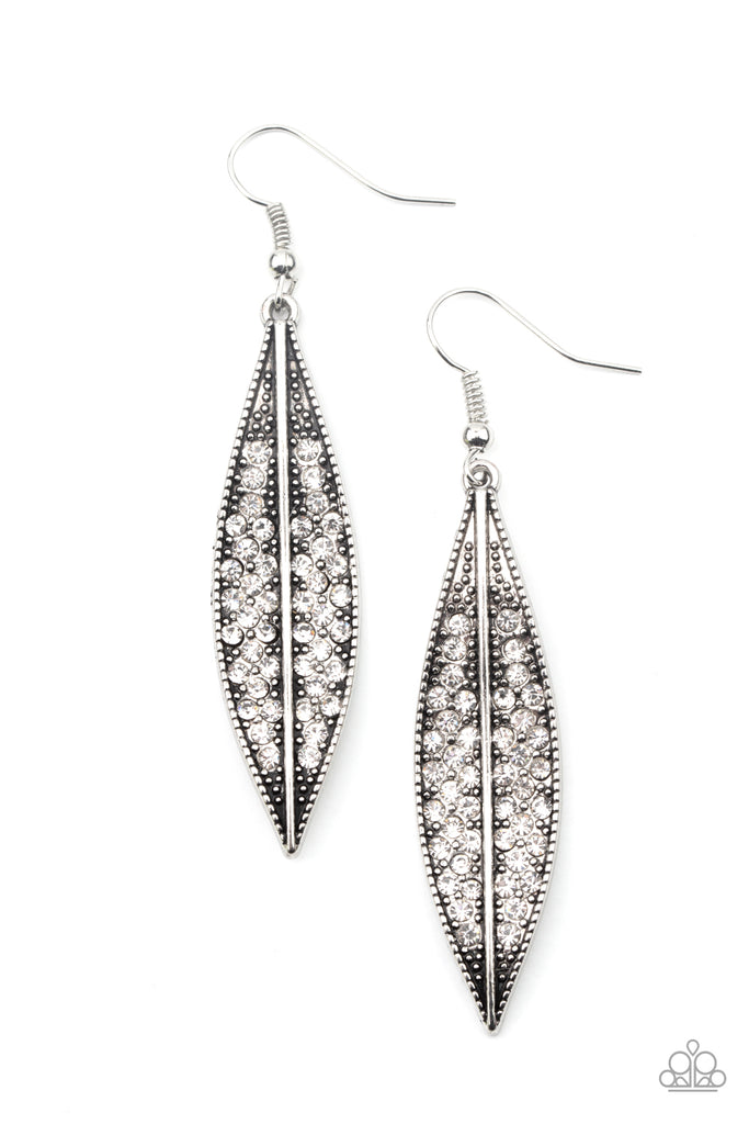The front of a studded silver leaf is encrusted in glittery white rhinestones, creating a seasonal shimmer. Earring attaches to a standard fishhook fitting.  Sold as one pair of earrings.