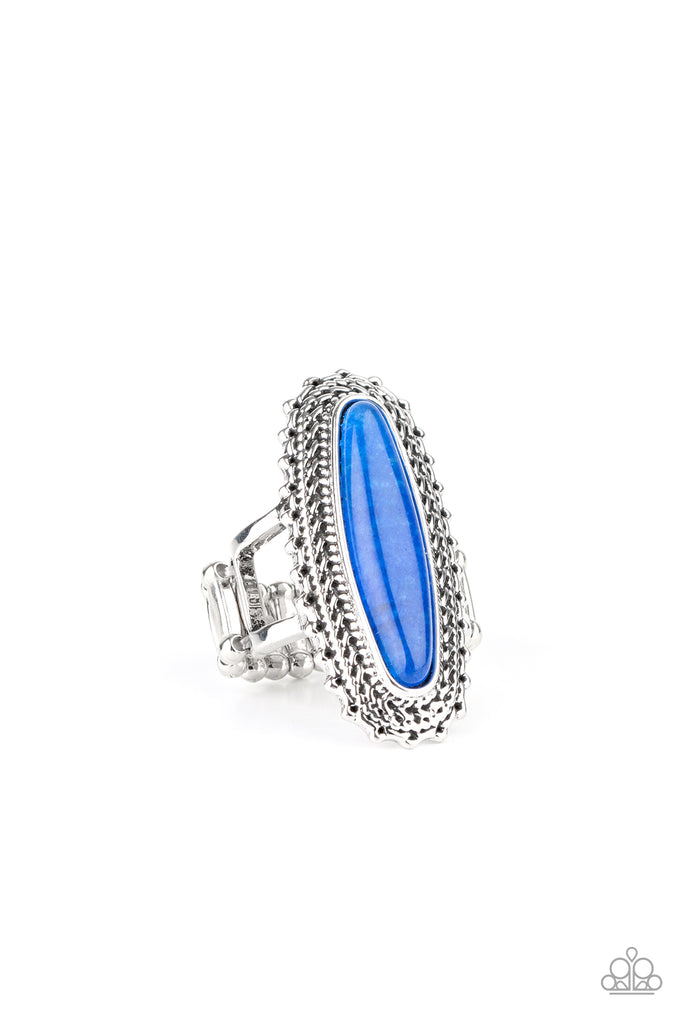 Mystical Mecca - Blue An oblong blue stone adorns the center of an elongated silver frame featuring mismatched silver textures for a bold artisan look. Features a stretchy band for a flexible fit.  Sold as one individual ring.