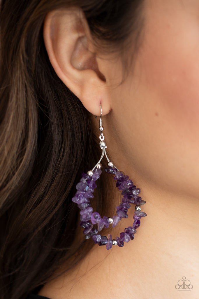 An earthy collection of raw purple stones and dainty silver beads are threaded along two dainty silver wires, layering into an earthy teardrop. Earring attaches to a standard fishhook fitting.  Sold as one pair of earrings.  
