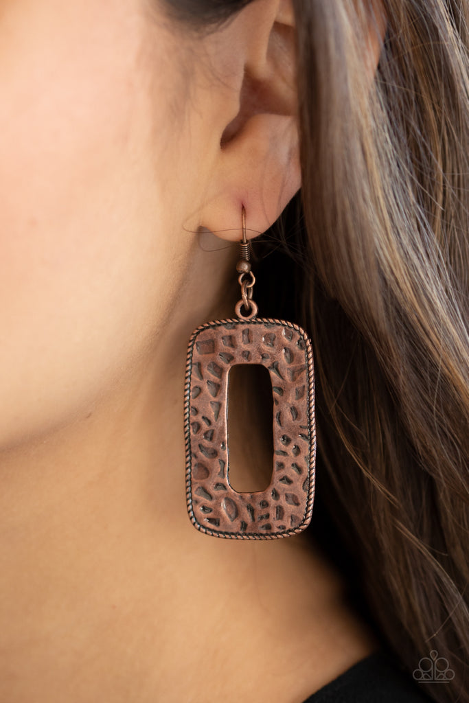 Bordered in metallic rope-like details, a copper rectangular frame has been hammered in antiqued textures for a rustically radiant look. Earring attaches to a standard fishhook fitting.  Sold as one pair of earrings.