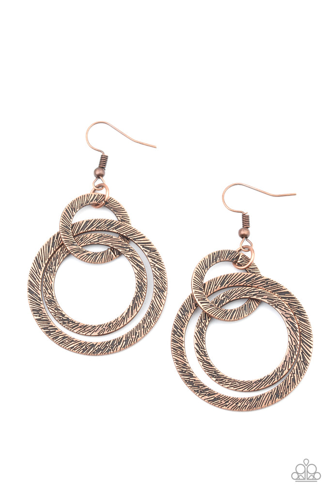 Etched and embossed in shimmery textures, a trio of antiqued copper hoops interlock into a dizzying lure. Earring attaches to a standard fishhook fitting.  Sold as one pair of earrings.