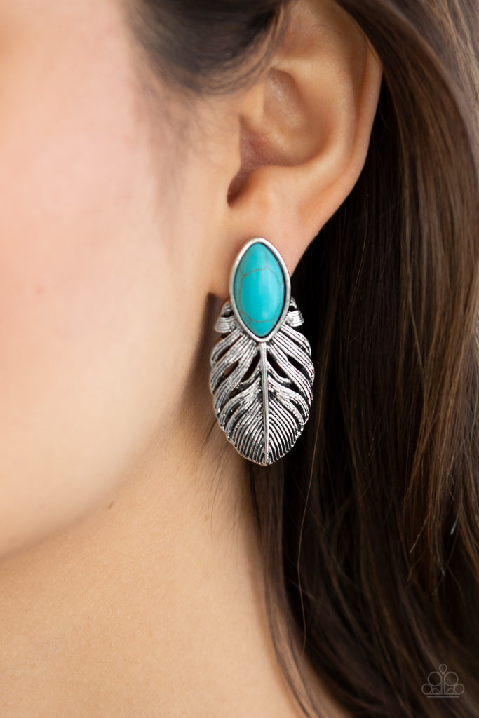 Chiseled into a tranquil marquise shape, a refreshing turquoise stone is pressed into the top of an antiqued silver frame for a seasonal look. Earring attaches to a standard post fitting.  Sold as one pair of post earrings.