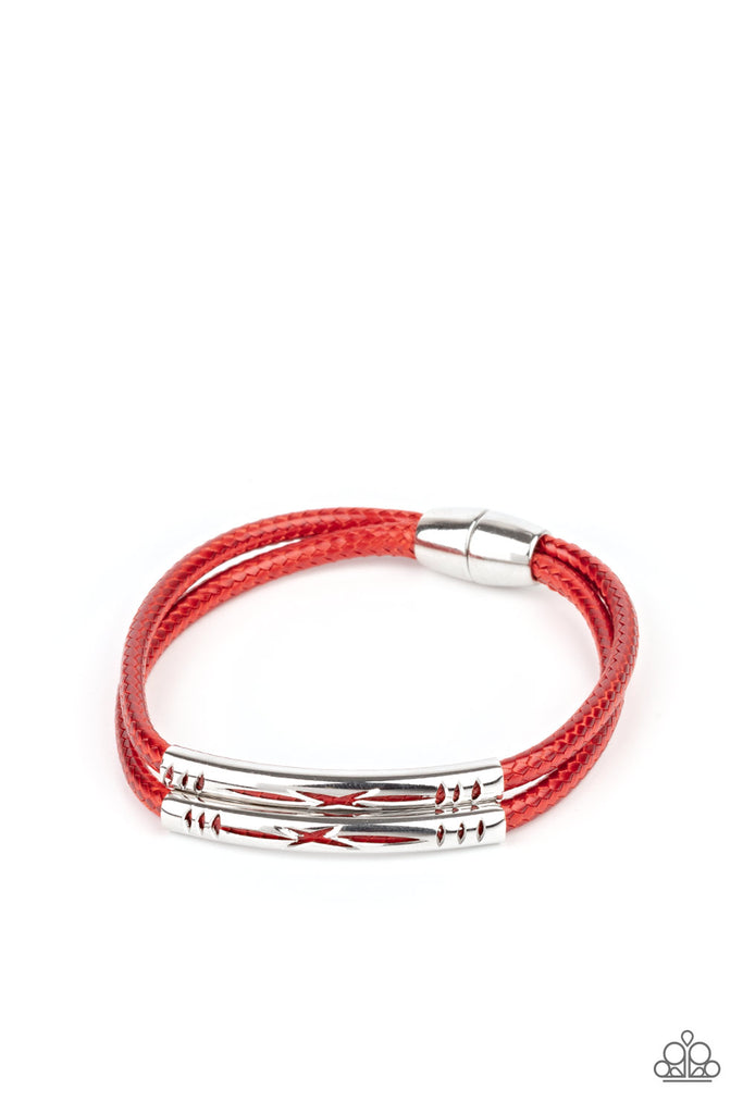 Featuring tribal inspired cutouts, stenciled silver bars slide along two shiny red cords around the wrist for an adventurous look. Features a magnetic closure.  Sold as one individual bracelet.