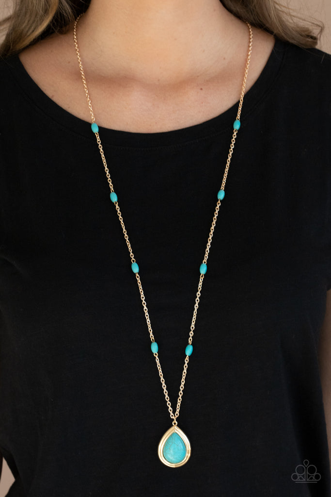 Dotted with turquoise stone beads, a lengthened gold chain gives way to a refreshing turquoise stone teardrop pendant for a simply seasonal finish. Features an adjustable clasp closure.  Sold as one individual necklace. Includes one pair of matching earrings.  