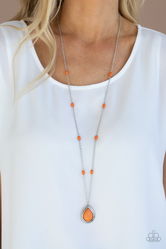 Dotted with orange stone beads, a lengthened silver chain gives way to a vivacious orange stone teardrop pendant for a simply seasonal finish. Features an adjustable clasp closure.  Sold as one individual necklace. Includes one pair of matching earrings.  