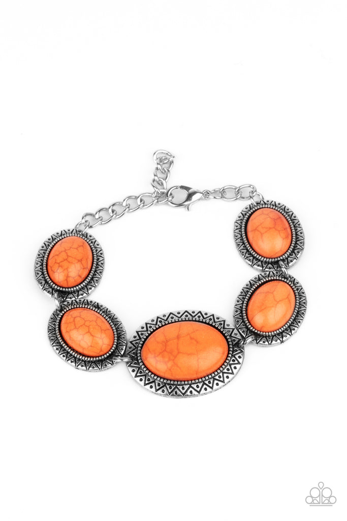 Stamped in dotted sunburst patterns, oval orange stone encrusted silver frames delicately link around the wrist for a colorful southwestern flair. Features an adjustable clasp closure.  Sold as one individual bracelet.